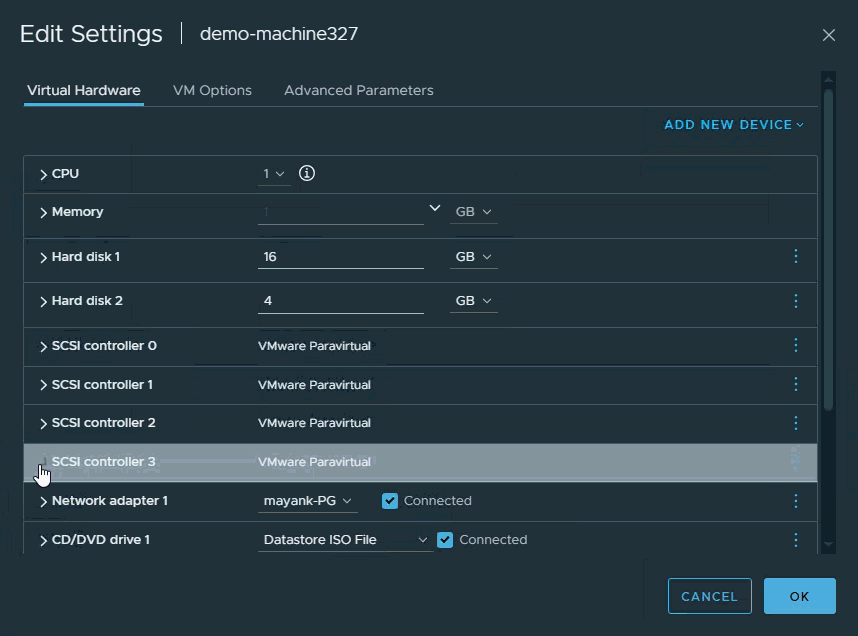 Screenshot showing the 'Edit Settings' page for a virtual machine named 'demo-machine327', displaying hardware options including CPU, Memory, Hard disks, and SCSI controllers.
